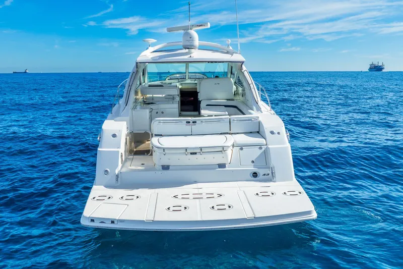 Slide: The Image of 2009 Sea Ray 470 Sundancer yacht on open blue ocean. - 7