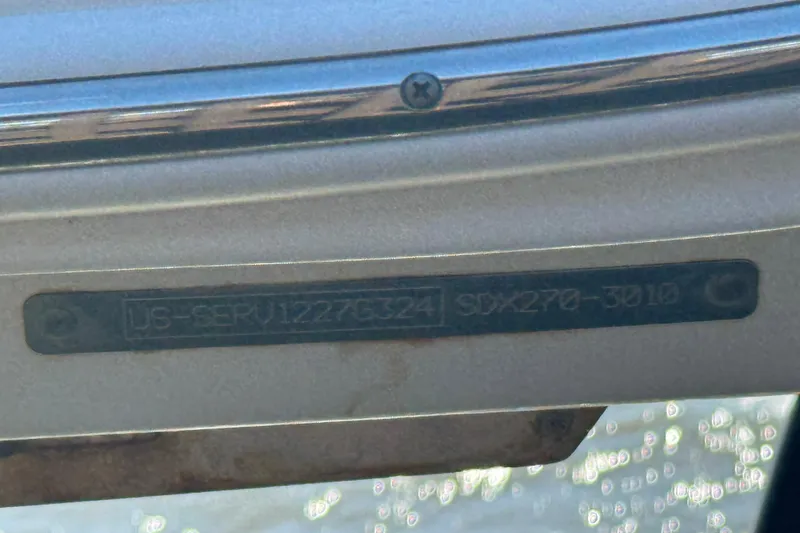 Slide: The Image of 2024 Sea Ray SDX 270 boat window view of serene blue waters. - 24