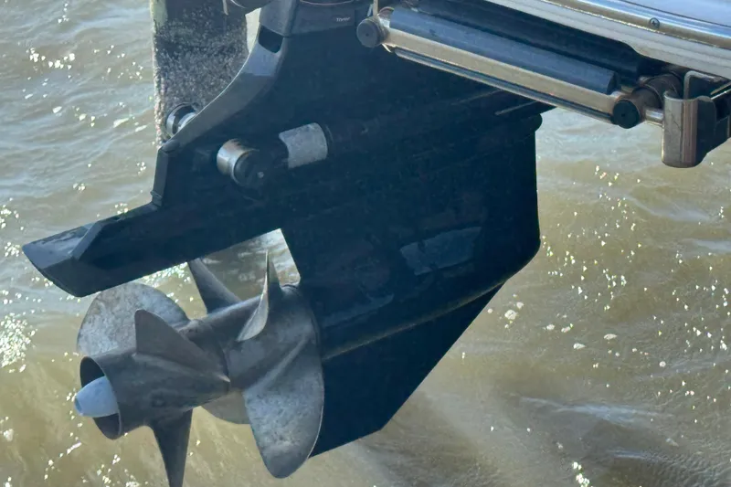 Slide: The Image of 2024 Sea Ray SDX 270 boat propeller in water, close-up view. - 39