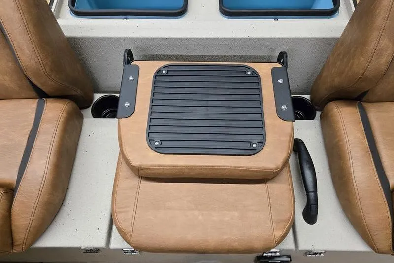 Slide: The Image of 2026 Avid 18 Vertex boat interior with tan leather seats and black accents. - 13