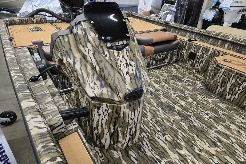 Slide: The Image of Camouflage-patterned 2026 Avid 20 Rogue SC boat interior with sleek design and modern features. - 14
