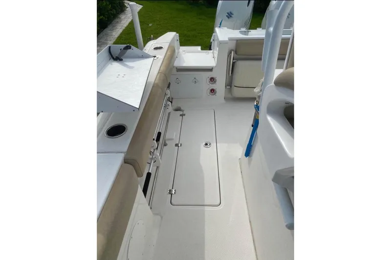 Slide: The Image of 2016 Sea Fox 286 Commander boat interior with seating and storage compartments. - 9