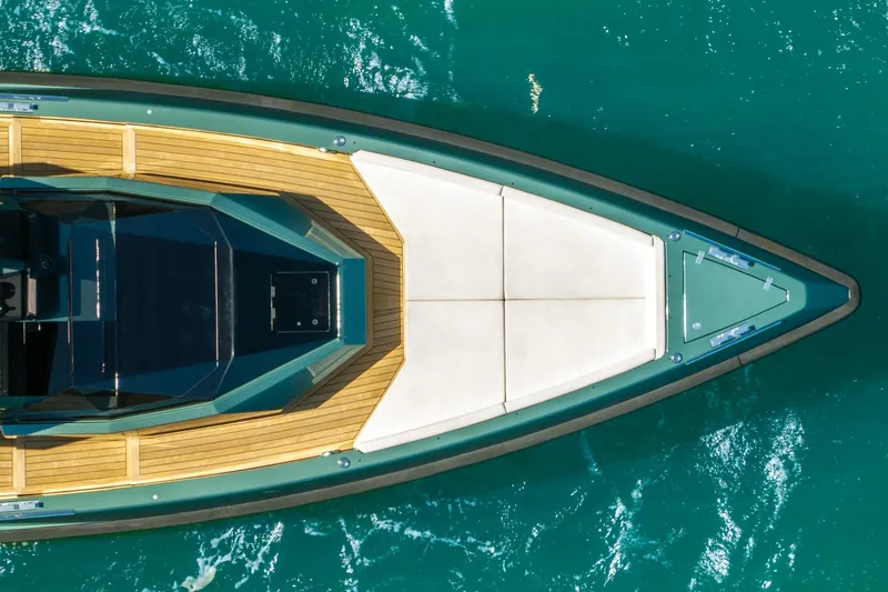 Slide: The Image of Top view of 2021 Wally 48 Wally Tender yacht on turquoise water. - 10