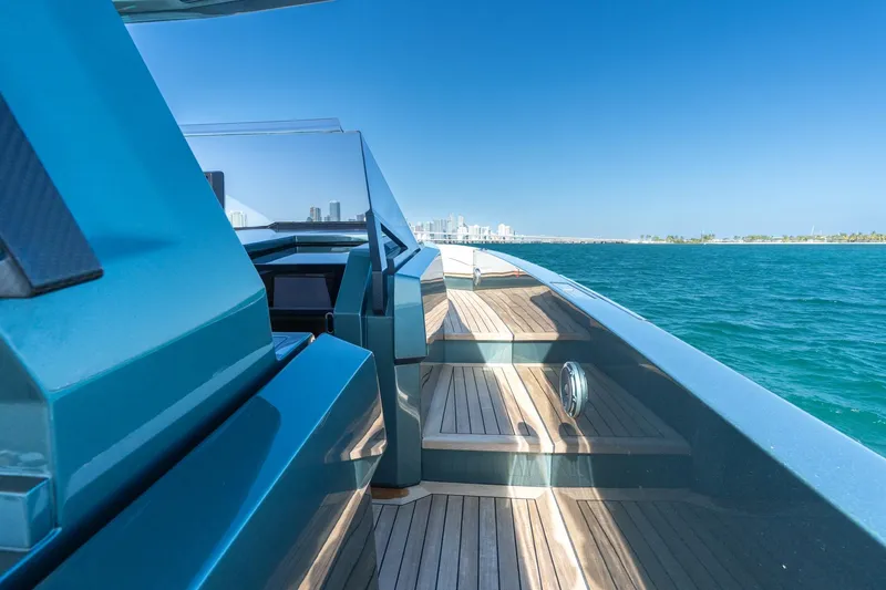 Slide: The Image of 2021 Wally 48 Wally Tender yacht cruising on clear blue waters. - 32