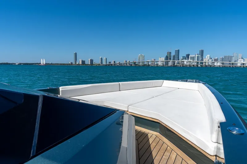Slide: The Image of 2021 Wally 48 Wally Tender yacht with city skyline and ocean view. - 37