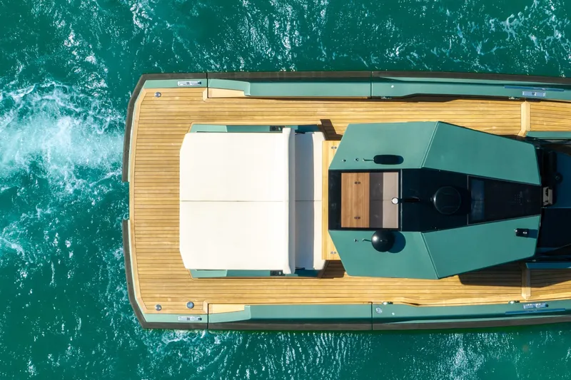 Slide: The Image of Top view of 2021 Wally 48 Wally Tender yacht on turquoise water. - 9
