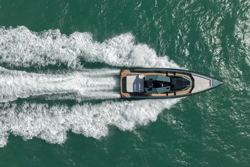 Slide: The Image of Aerial view of 2021 Wally 48 Wally Tender cruising on turquoise water. - 11