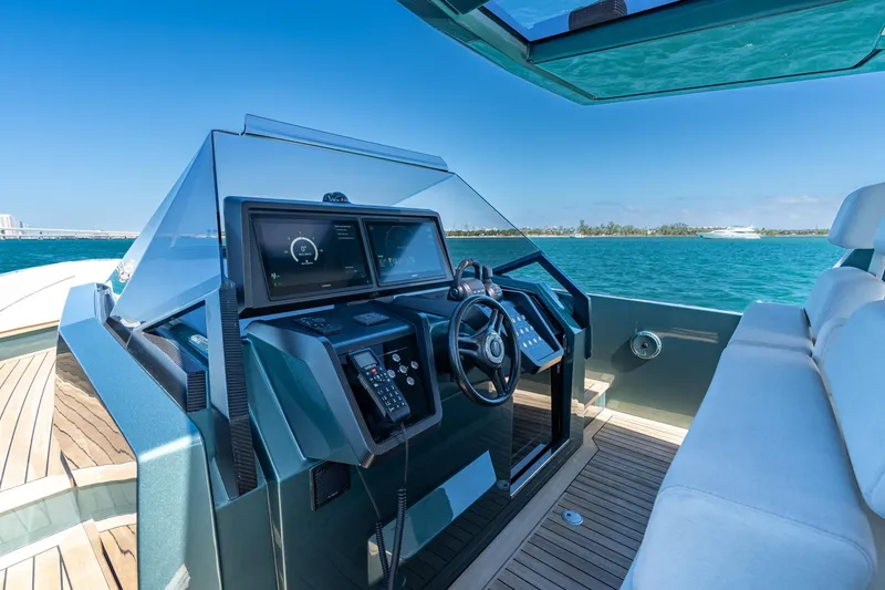 Slide: The Image of Helm of 2021 Wally 48 Wally Tender yacht with modern controls and ocean view. - 26