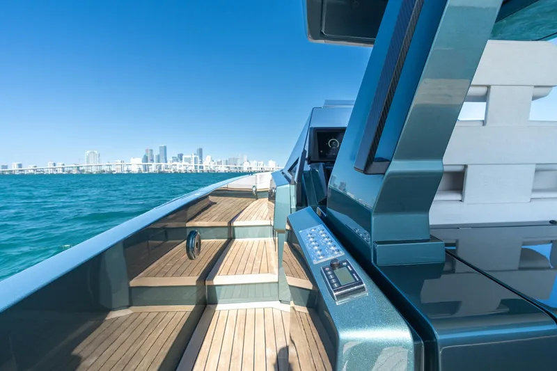 Slide: The Image of Luxurious 2021 Wally 48 Wally Tender yacht with city skyline in background. - 33