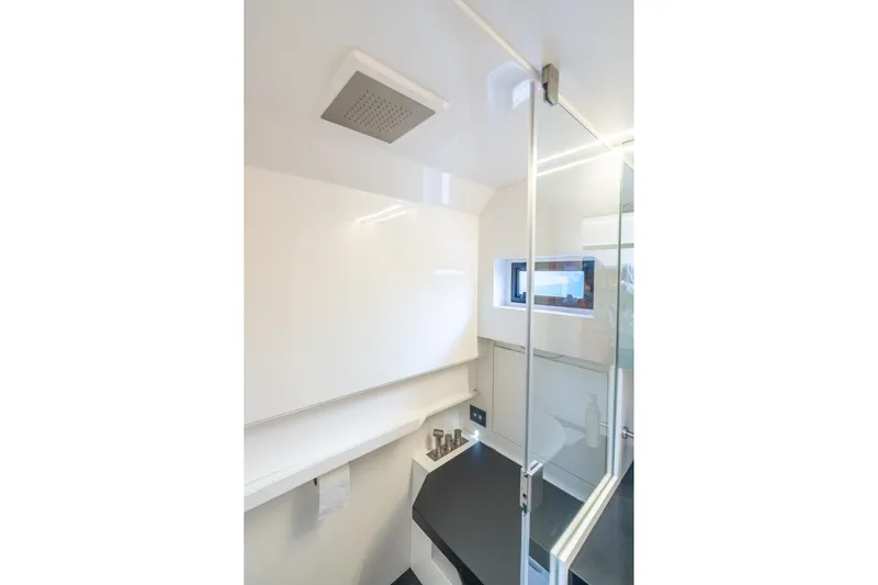 Slide: The Image of Modern bathroom interior of 2021 Wally 48 Wally Tender yacht with glass door and sleek design. - 46