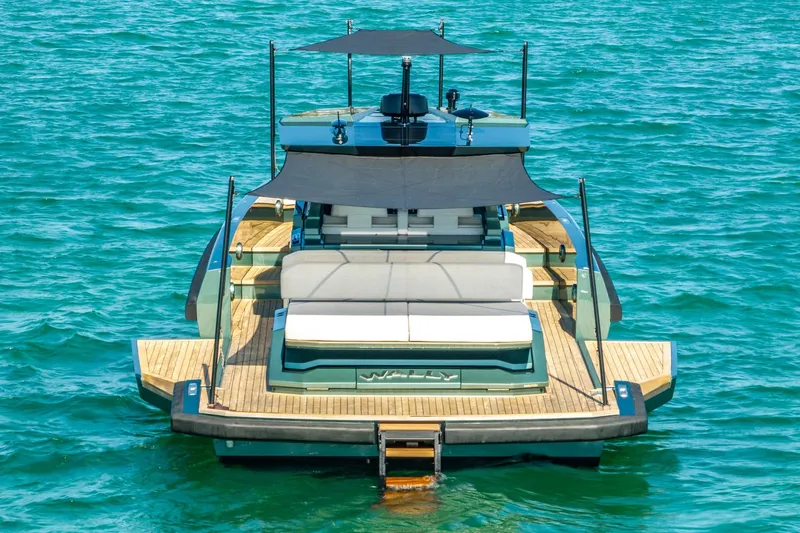 Slide: The Image of 2021 Wally 48 Wally Tender luxury yacht on turquoise water, rear view. - 5