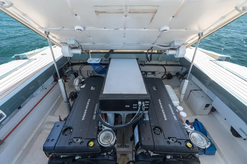 Slide: The Image of Engine compartment of 2021 Wally 48 Wally Tender with Volvo Penta engines, open hatch view. - 50