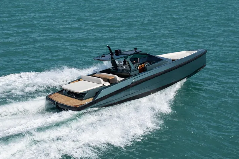 Slide: The Image of 2021 Wally 48 Wally Tender cruising on open water, showcasing sleek design and luxury. - 6