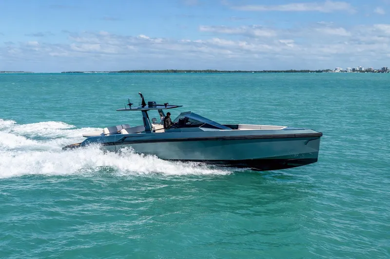 Slide: The Image of 2021 Wally 48 Wally Tender cruising on turquoise ocean waters. - 7