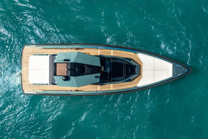 Slide: The Image of Overhead view of 2021 Wally 48 Wally Tender yacht on turquoise water. - 8