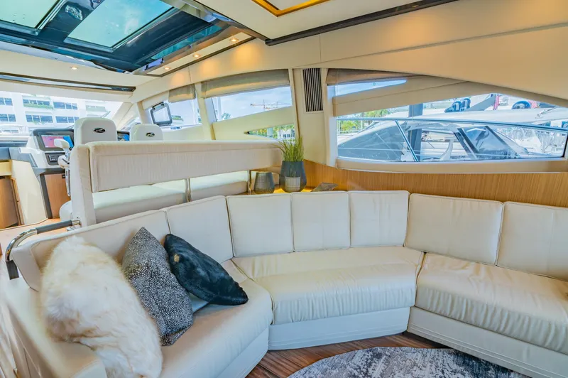 Slide: The Image of Luxurious interior of 2018 Sea Ray L590 yacht with plush seating and modern design. - 25