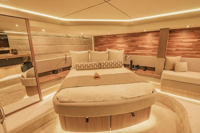 Slide: The Image of Luxurious 2018 Sea Ray L590 yacht bedroom with modern design and ambient lighting. - 38