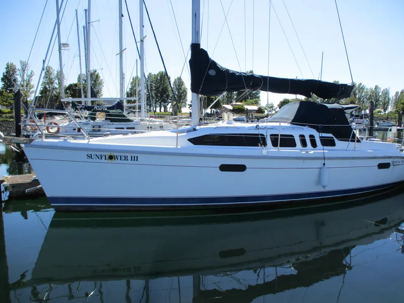 Slide: The Image of 1995 Hunter 336 sailboat docked, named Sunflower III. - 4