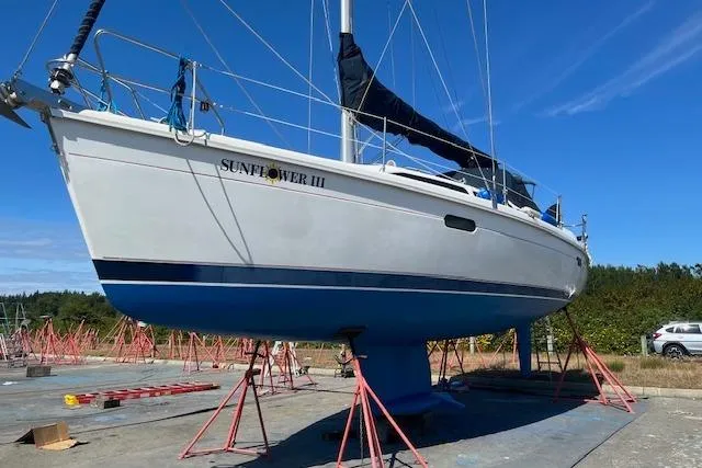 Slide: The Image of Sailboat "Sunflower III" on stands, 1995 Hunter 336 model, clear blue sky background. - 9