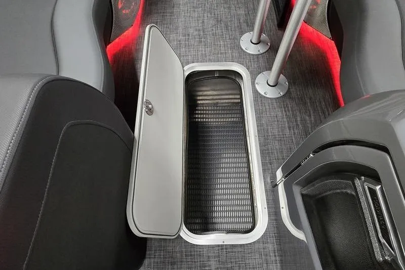 Slide: The Image of Underfloor storage compartment in 2026 AquaPatio 235 DFL boat with sleek interior design. - 19