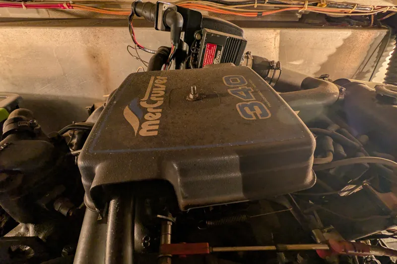 Slide: The Image of Engine of 1984 Chris-Craft 382 Commander with MerCruiser 340 cover. - 102