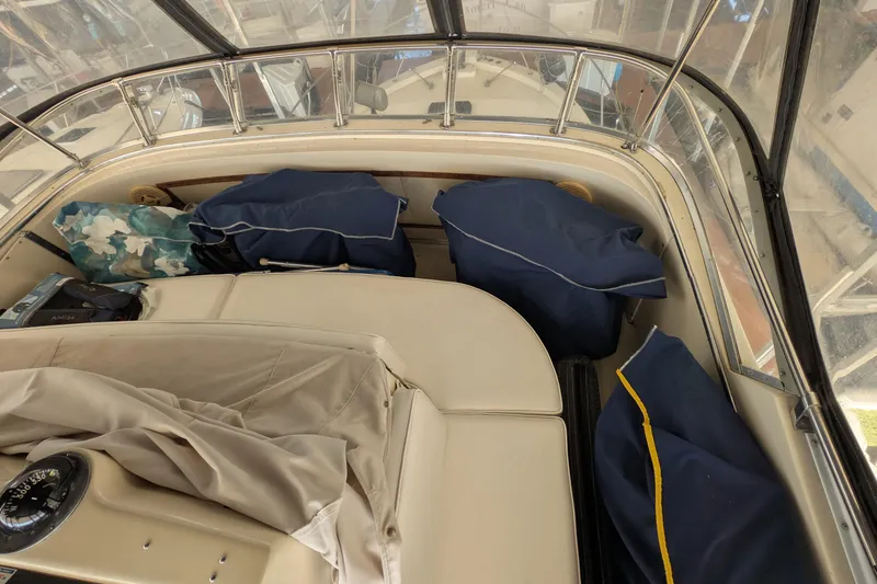 Slide: The Image of 1984 Chris-Craft 382 Commander interior with cushions and navigation equipment. - 12