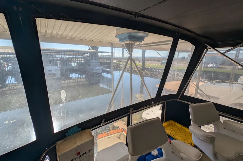 Slide: The Image of Interior view of 1984 Chris-Craft 382 Commander boat docked at marina. - 15