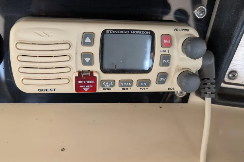 Slide: The Image of Standard Horizon marine radio on 1984 Chris-Craft 382 Commander boat dashboard. - 23
