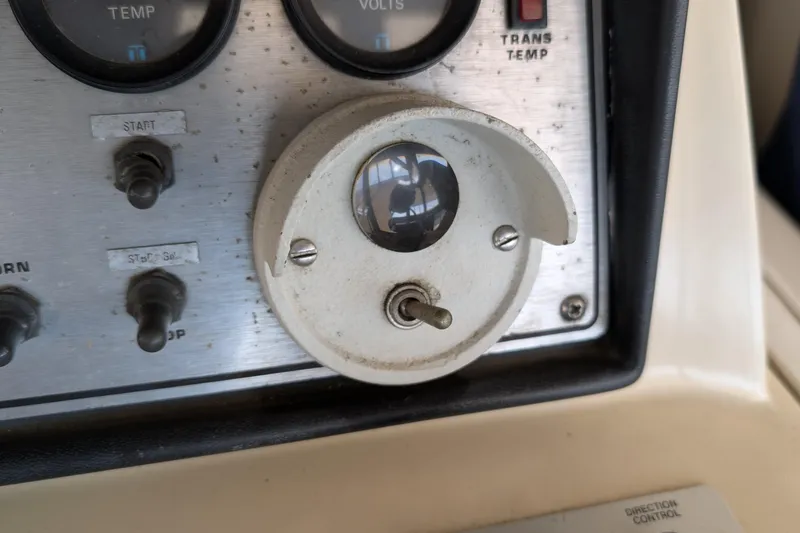 Slide: The Image of Control panel of 1984 Chris-Craft 382 Commander boat with gauges and switches. - 24
