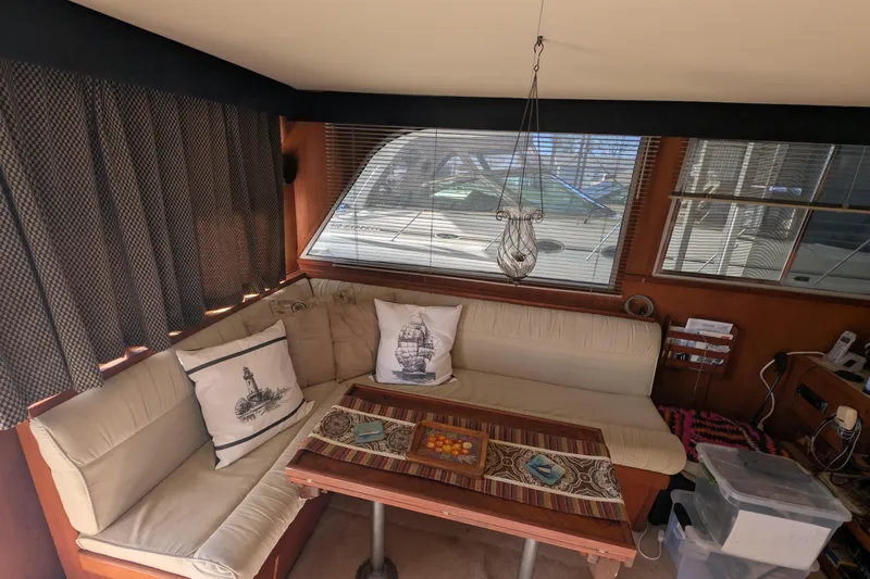 Slide: The Image of Interior of 1984 Chris-Craft 382 Commander with cozy seating and nautical decor. - 30