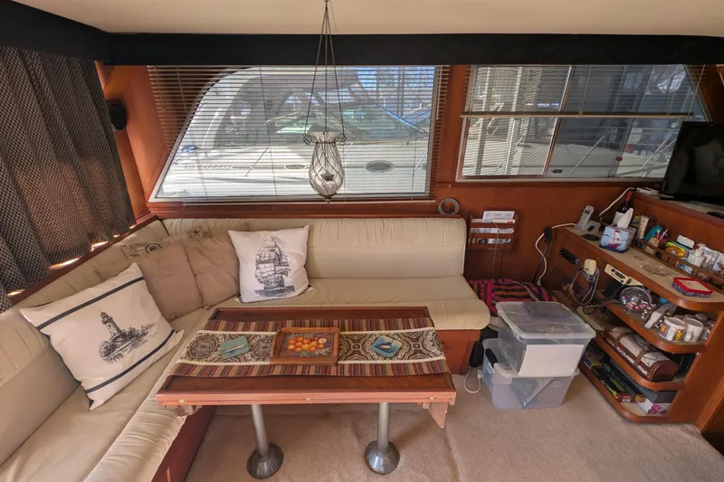 Slide: The Image of Interior of 1984 Chris-Craft 382 Commander with cozy seating and nautical decor. - 31