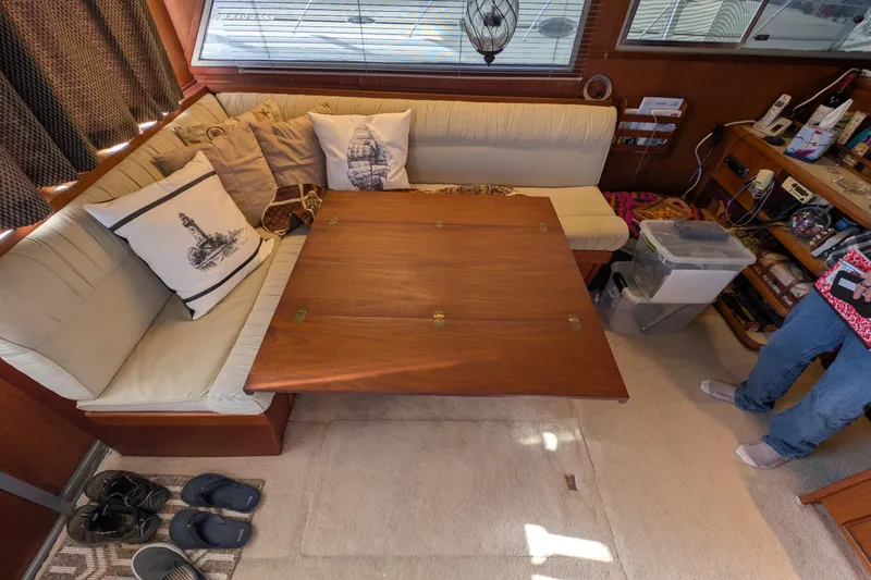 Slide: The Image of Interior of 1984 Chris-Craft 382 Commander with cozy seating and wooden table. - 37