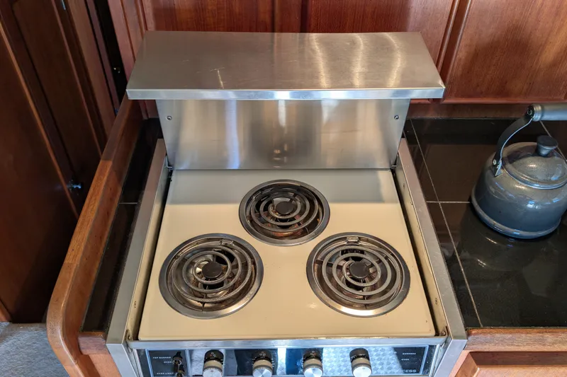Slide: The Image of Electric stove with three burners in a 1984 Chris-Craft 382 Commander kitchen. - 39