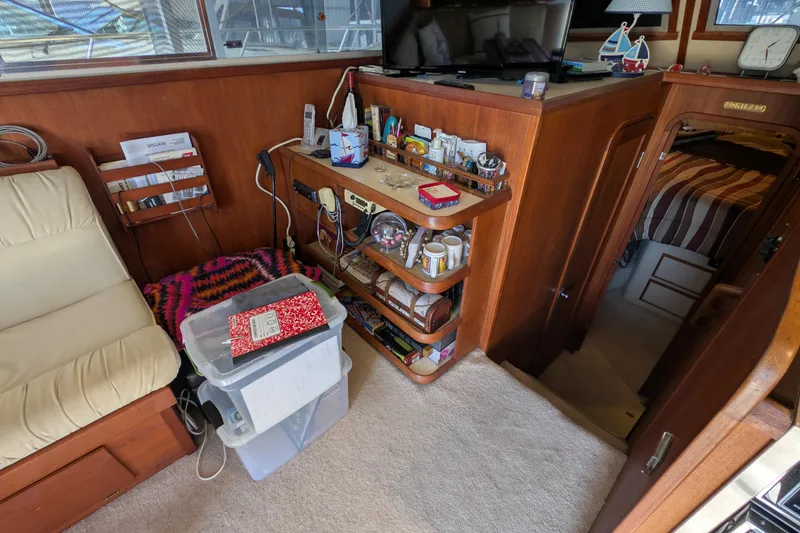 Slide: The Image of Interior of 1984 Chris-Craft 382 Commander with cozy seating and organized storage. - 49