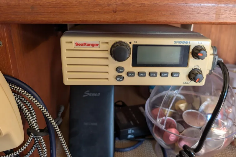 Slide: The Image of SeaRanger SR5561 radio on 1984 Chris-Craft 382 Commander boat, with control knobs and display. - 63