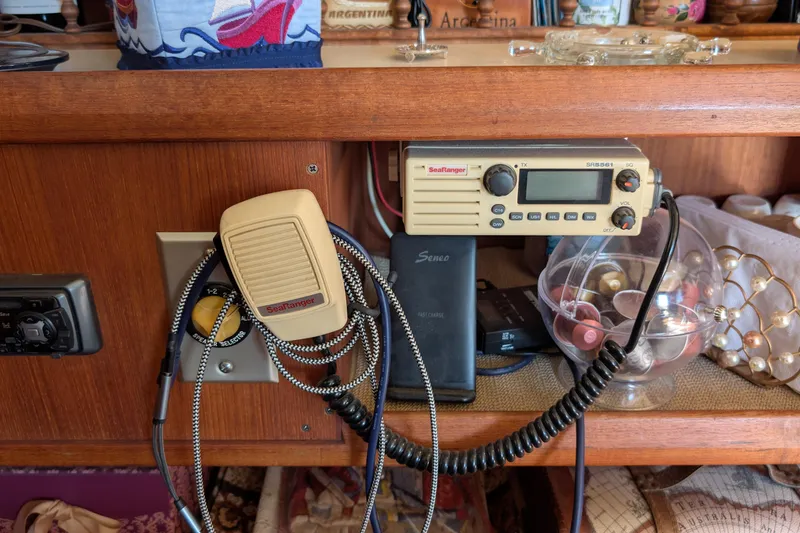 Slide: The Image of 1984 Chris-Craft 382 Commander interior with SeaRanger radio and microphone setup. - 64