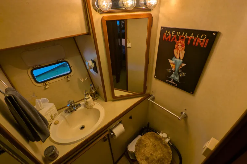 Slide: The Image of Bathroom interior of 1984 Chris-Craft 382 Commander with vintage decor and mirror. - 80