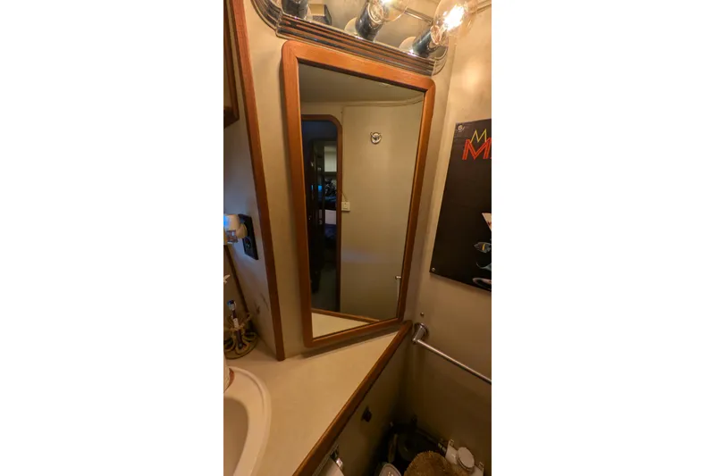 Slide: The Image of Bathroom interior of 1984 Chris-Craft 382 Commander yacht with mirror and lighting. - 86