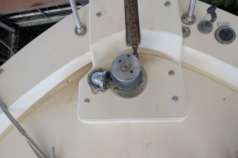 Slide: The Image of 1984 Chris-Craft 382 Commander boat deck with anchor winch and chain. - 92
