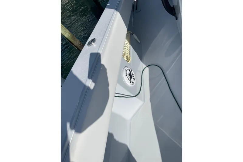 Slide: The Image of 2022 Conch 33 boat interior with speaker and coiled rope. - 9