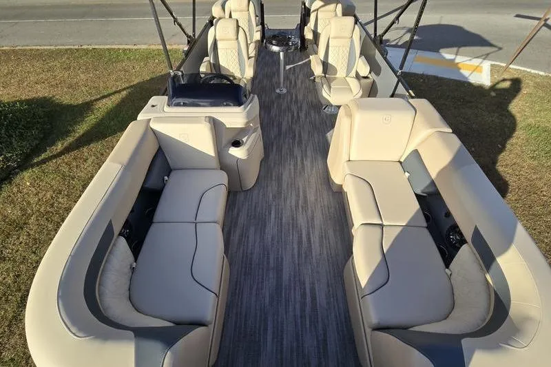 Slide: The Image of 2025 Godfrey Sweetwater 2286 QS pontoon boat with spacious seating and modern design. - 11