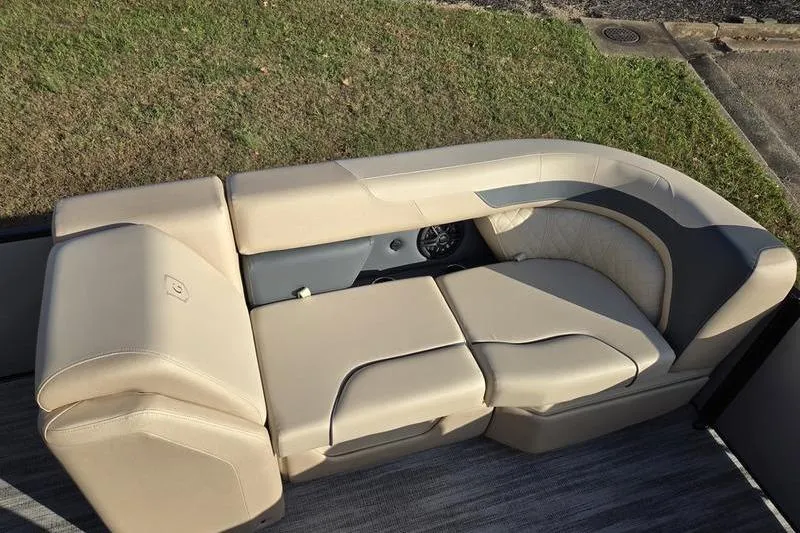 Slide: The Image of Luxurious seating on 2025 Godfrey Sweetwater 2286 QS pontoon boat, beige upholstery. - 6
