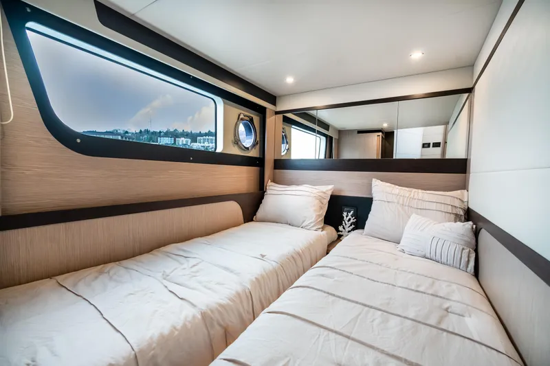 Slide: The Image of Luxurious twin cabin interior of 2026 Absolute 48 Coupe yacht. - 43