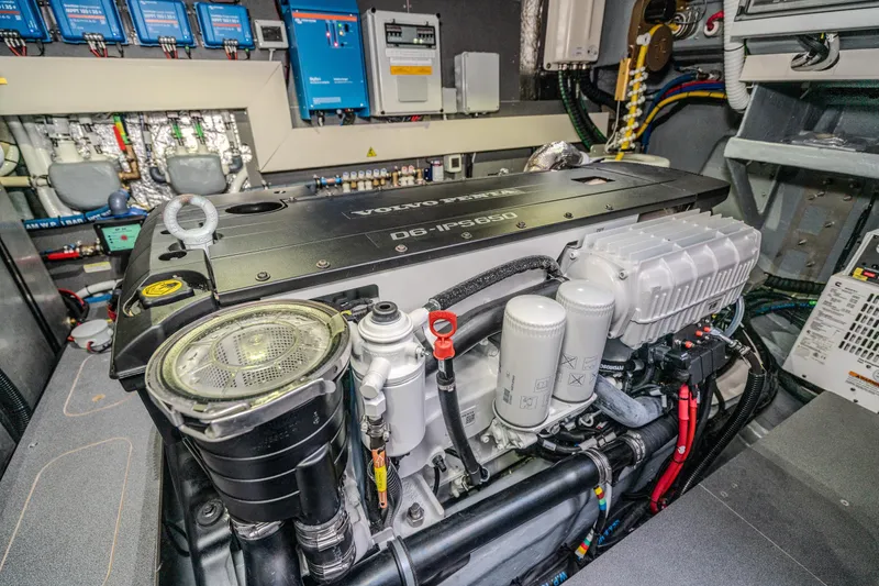 Slide: The Image of Engine room of 2026 Absolute 48 Coupe with Volvo D6-IPS650 engine. - 54