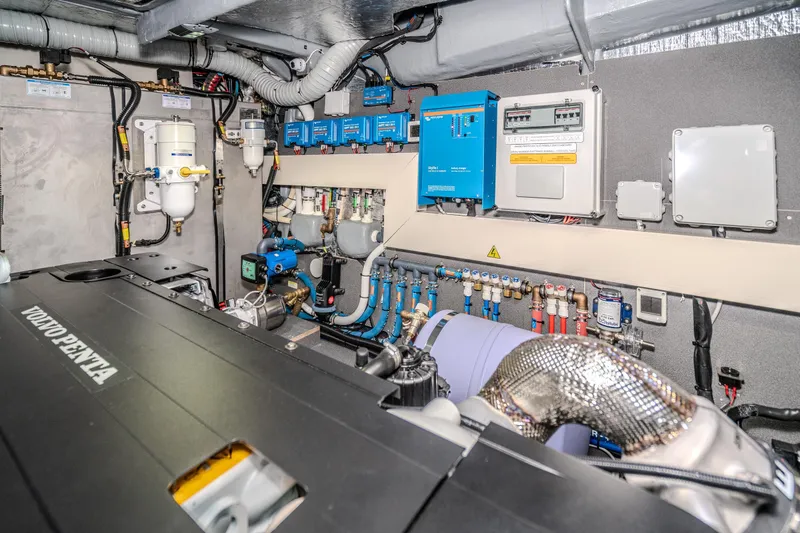 Slide: The Image of Engine room of 2026 Absolute 48 Coupe yacht with Volvo Penta components and advanced systems. - 58