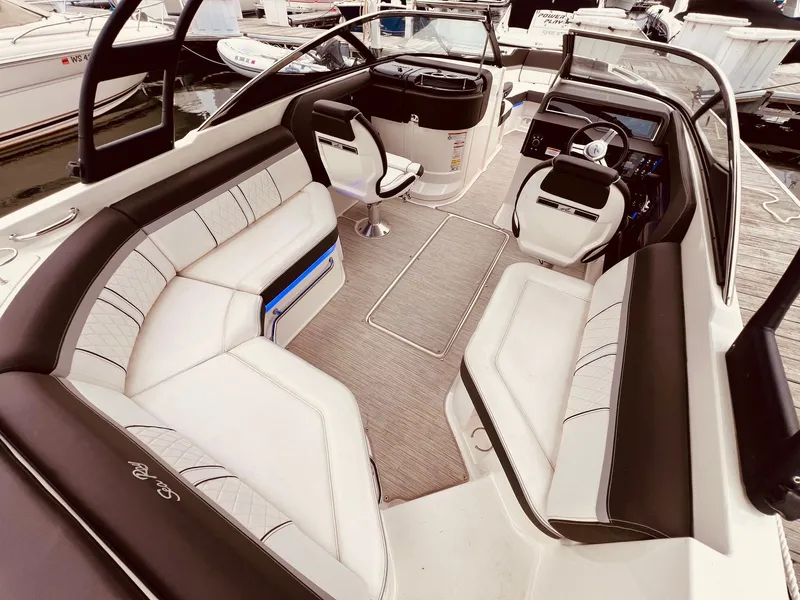 Slide: The Image of Interior of a 2017 Sea Ray SLX 250 boat with luxurious seating. - 11
