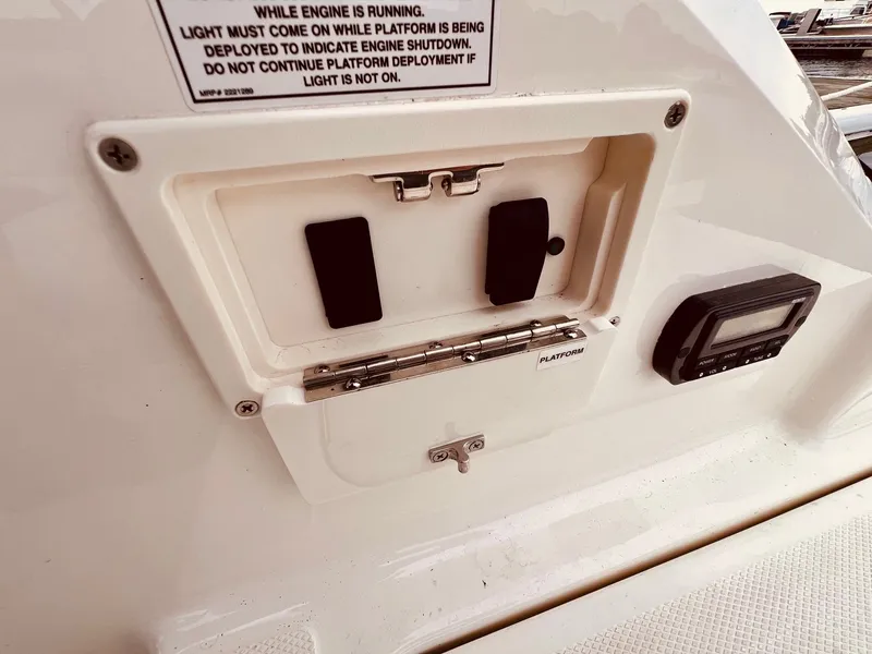 Slide: The Image of Sea Ray SLX 250 2017 boat control panel and platform control. - 12