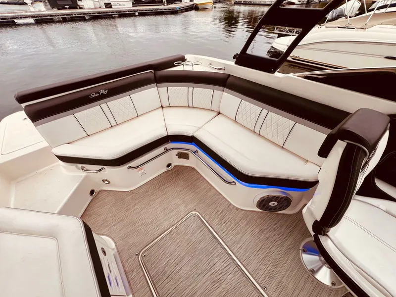 Slide: The Image of Interior of a 2017 Sea Ray SLX 250 boat at the dock. - 14