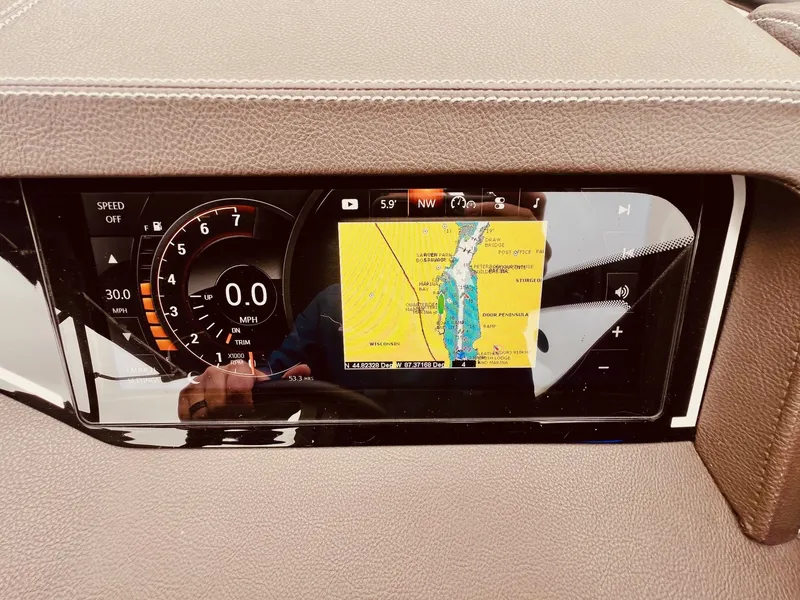 Slide: The Image of Dashboard of 2017 Sea Ray SLX 250 boat with navigation system. - 19