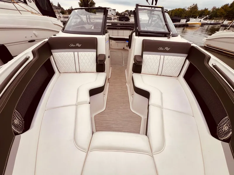 Slide: The Image of Interior of a 2017 Sea Ray SLX 250 with luxurious seating. - 29